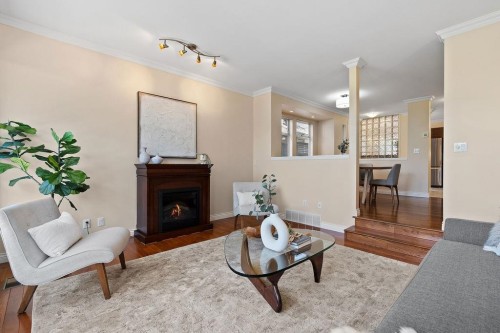 1-230 Keith Road E, North Vancouver, BC - Indoor Photo Showing Living Room With Fireplace