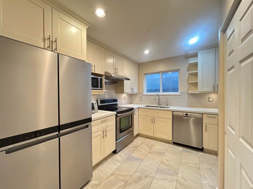 3147 8Th Avenue W, Vancouver, BC - Indoor Photo Showing Kitchen With Double Sink