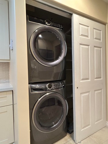 3147 8Th Avenue W, Vancouver, BC - Indoor Photo Showing Laundry Room