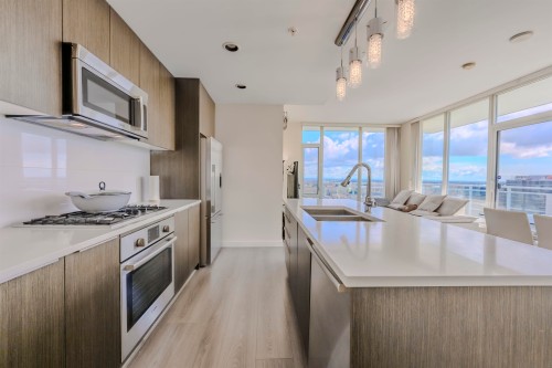 1705-8677 Capstan Way, Richmond, BC - Indoor Photo Showing Kitchen With Double Sink