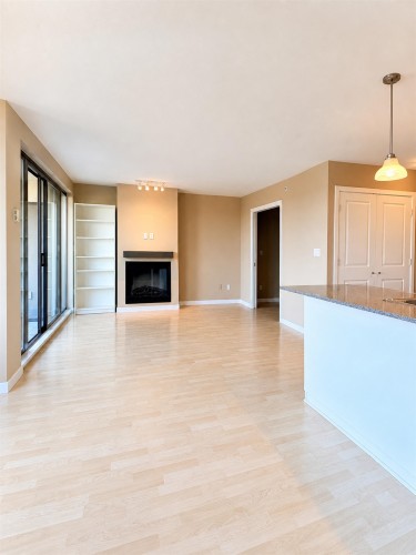 602-4333 Central Boulevard, Burnaby, BC - Indoor Photo Showing Living Room With Fireplace