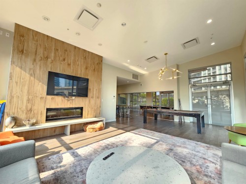 201-691 North Road, Coquitlam, BC - Indoor Photo Showing Living Room With Fireplace