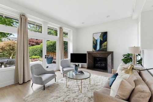 3420 1St Avenue W, Vancouver, BC - Indoor Photo Showing Living Room With Fireplace
