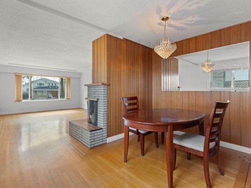 3369 Price Street, Vancouver, BC - Indoor Photo Showing Dining Room With Fireplace