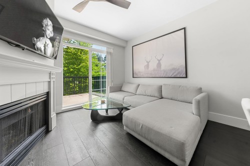 404-5605 Hampton Place, Vancouver, BC - Indoor Photo Showing Living Room With Fireplace