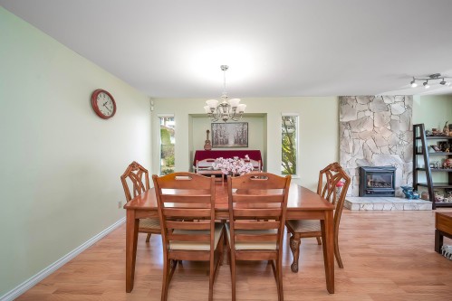11 Harbour Place, Port Moody, BC - Indoor Photo Showing Dining Room With Fireplace