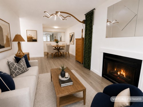 303-9890 Manchester Drive, Burnaby, BC - Indoor Photo Showing Living Room With Fireplace