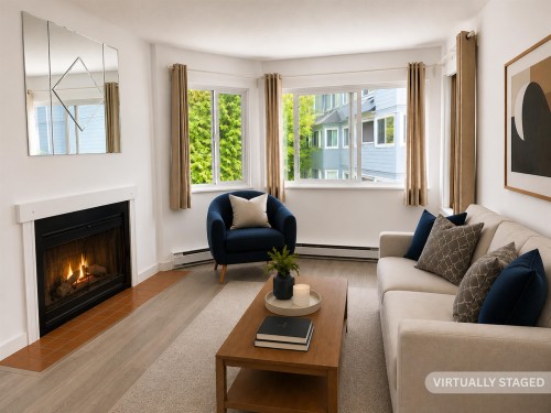 303-9890 Manchester Drive, Burnaby, BC - Indoor Photo Showing Living Room With Fireplace