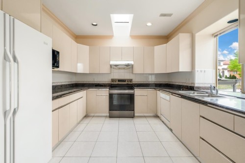 6520 Doman Street, Vancouver, BC - Indoor Photo Showing Kitchen With Double Sink