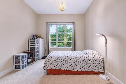 113-5535 Admiral Way, Delta, BC - Indoor Photo Showing Bedroom