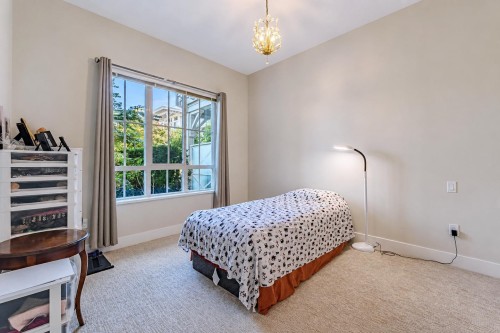 113-5535 Admiral Way, Delta, BC - Indoor Photo Showing Bedroom