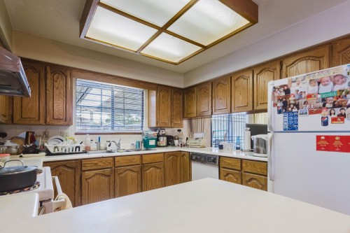 3230 Garden Drive, Vancouver, BC - Indoor Photo Showing Kitchen With Double Sink