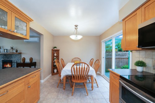 772 Appleyard Court, Port Moody, BC - Indoor Photo Showing Dining Room With Fireplace