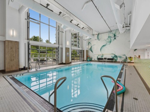 205-8538 River District Crossing, Vancouver, BC - Indoor Photo Showing Other Room With In Ground Pool