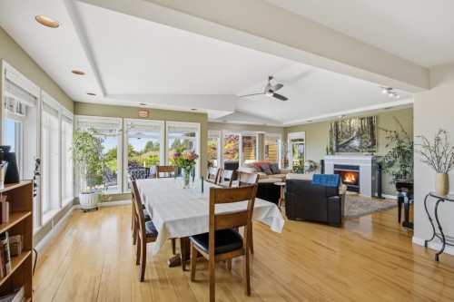 4827 Bluegrouse Drive, Sechelt, BC - Indoor Photo Showing Dining Room With Fireplace