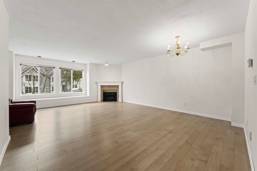 5-2600 Beaverbrook Crescent, Burnaby, BC - Indoor Photo Showing Living Room With Fireplace