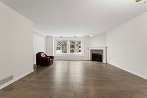 5-2600 Beaverbrook Crescent, Burnaby, BC - Indoor Photo Showing Living Room With Fireplace