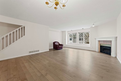 5-2600 Beaverbrook Crescent, Burnaby, BC - Indoor Photo Showing Living Room With Fireplace