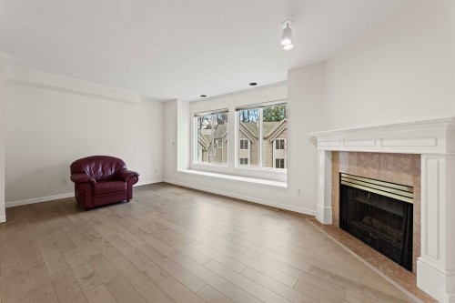 5-2600 Beaverbrook Crescent, Burnaby, BC - Indoor Photo Showing Living Room With Fireplace