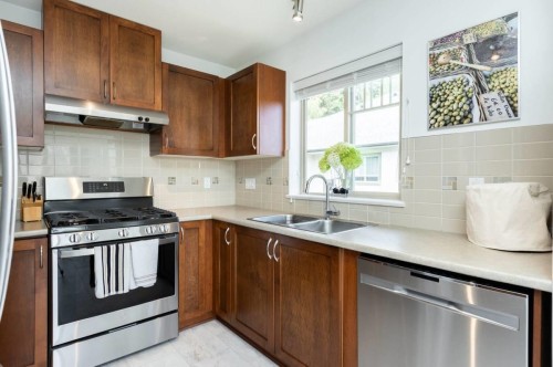 511-2951 Silver Springs Boulevard, Coquitlam, BC - Indoor Photo Showing Kitchen With Double Sink