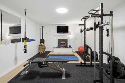 808 Signal Court, Coquitlam, BC - Indoor Photo Showing Gym Room With Fireplace