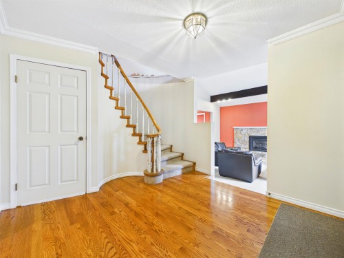 8232 Brynlor Drive, Burnaby, BC - Indoor Photo Showing Other Room With Fireplace