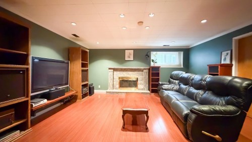 6462 Nanaimo Street, Vancouver, BC - Indoor Photo Showing Living Room With Fireplace