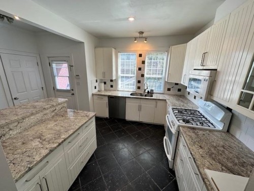 2878 8Th Avenue W, Vancouver, BC - Indoor Photo Showing Kitchen With Double Sink