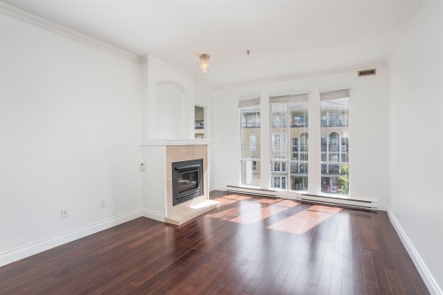 309-2 Renaissance Square, New Westminster, BC - Indoor Photo Showing Other Room With Fireplace