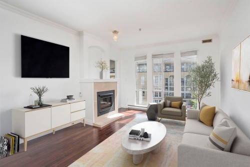 309-2 Renaissance Square, New Westminster, BC - Indoor Photo Showing Living Room With Fireplace