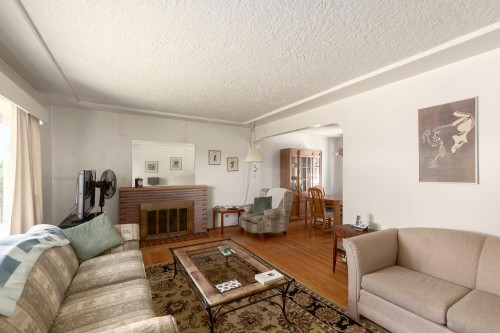 7759 14Th Avenue, Burnaby, BC - Indoor Photo Showing Living Room With Fireplace