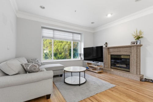 3186 18Th Avenue E, Vancouver, BC - Indoor Photo Showing Living Room With Fireplace