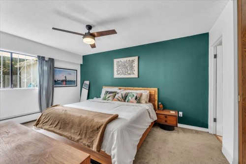 201-120 4Th Street E, North Vancouver, BC - Indoor Photo Showing Bedroom
