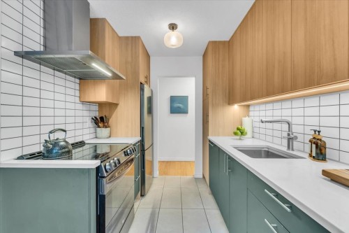 201-120 4Th Street E, North Vancouver, BC - Indoor Photo Showing Kitchen With Upgraded Kitchen