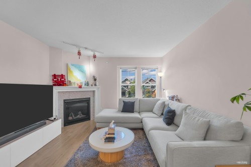 5-7360 Gilbert Road, Richmond, BC - Indoor Photo Showing Living Room With Fireplace