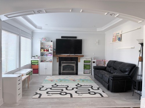 8068 11Th Avenue, Burnaby, BC - Indoor Photo Showing Living Room With Fireplace
