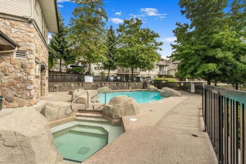 408-2959 Silver Springs Boulevard, Coquitlam, BC - Outdoor With In Ground Pool