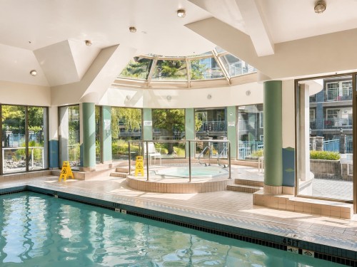 101-3070 Guildford Way, Coquitlam, BC - Indoor Photo Showing Other Room With In Ground Pool