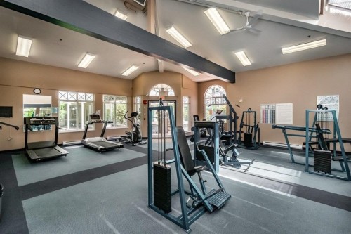 101-3070 Guildford Way, Coquitlam, BC - Indoor Photo Showing Gym Room