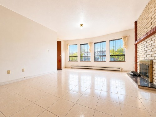 3292 43Rd Avenue E, Vancouver, BC - Indoor Photo Showing Other Room With Fireplace