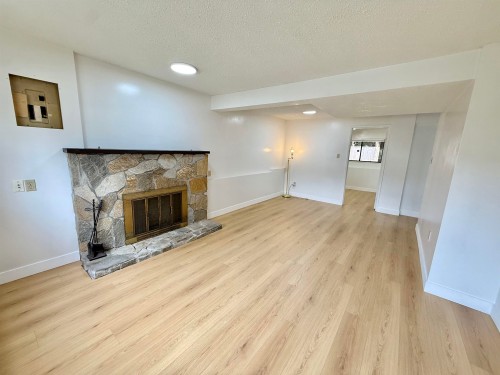 3220 Harwood Avenue, Coquitlam, BC - Indoor Photo Showing Living Room With Fireplace