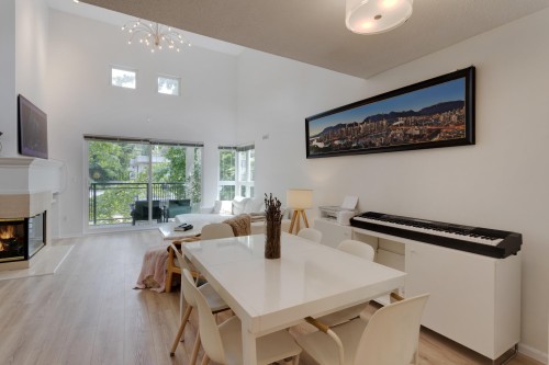 403-106 Kings Road W, North Vancouver, BC - Indoor Photo Showing Other Room With Fireplace