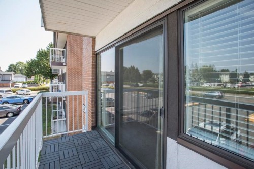 202-8040 Ryan Road, Richmond, BC - Outdoor With Balcony With Exterior
