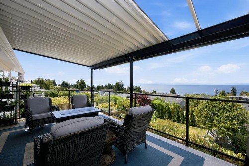 5111 Bay Road, Sechelt, BC - Outdoor With Body Of Water With Deck Patio Veranda With View With Exterior