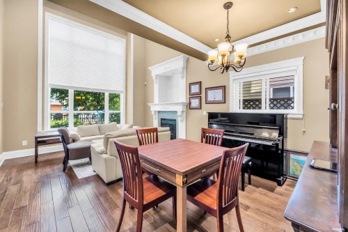 8480 Francis Road, Richmond, BC - Indoor Photo Showing Dining Room With Fireplace