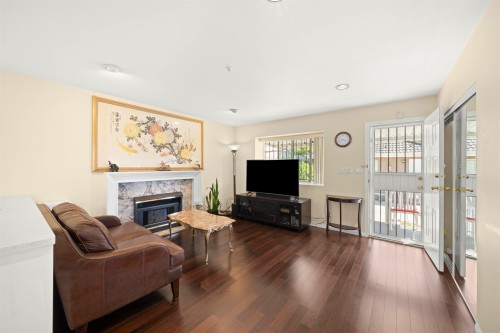 3838 Penticton Street, Vancouver, BC - Indoor Photo Showing Living Room With Fireplace