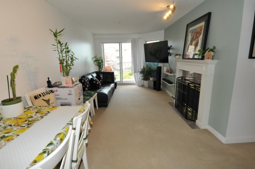 302-5888 Dover Crescent, Richmond, BC - Indoor With Fireplace