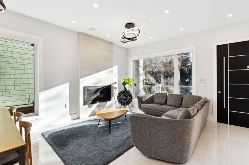 4437 13Th Avenue W, Vancouver, BC - Indoor Photo Showing Other Room With Fireplace