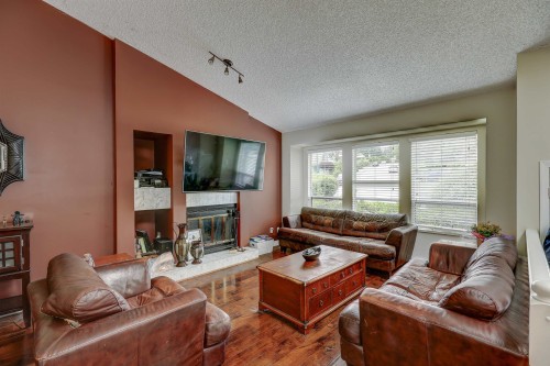 2986 Albion Drive, Coquitlam, BC - Indoor Photo Showing Living Room With Fireplace