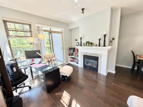 103-4883 Maclure Mews, Vancouver, BC - Indoor With Fireplace